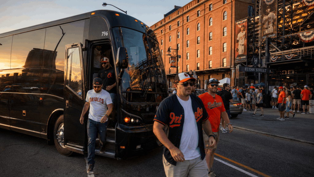 luxury charter bus arriving at camden yards in baltimore for an orioles game from alexandria