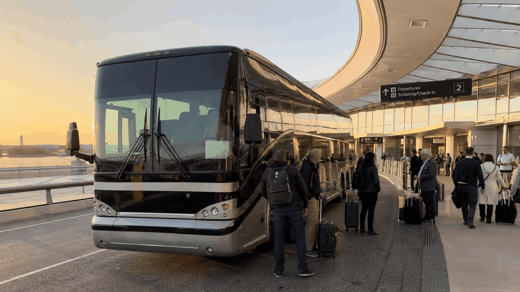 luxury charter bus drop-off at reagan national airport (dca) for an alexandria group transfer
