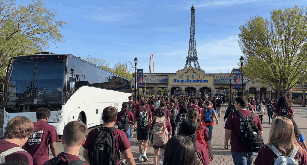 school group arriving by charter bus at kings dominion for an education day trip from alexandria