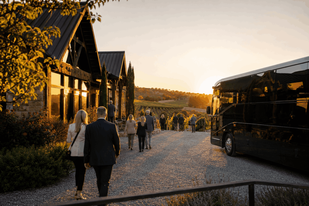luxury charter bus arriving at a loudoun county winery for a group wine tour from alexandria virginia