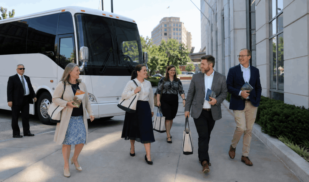 religious conference attendees arriving at a washington d.c. venue by charter bus from alexandria