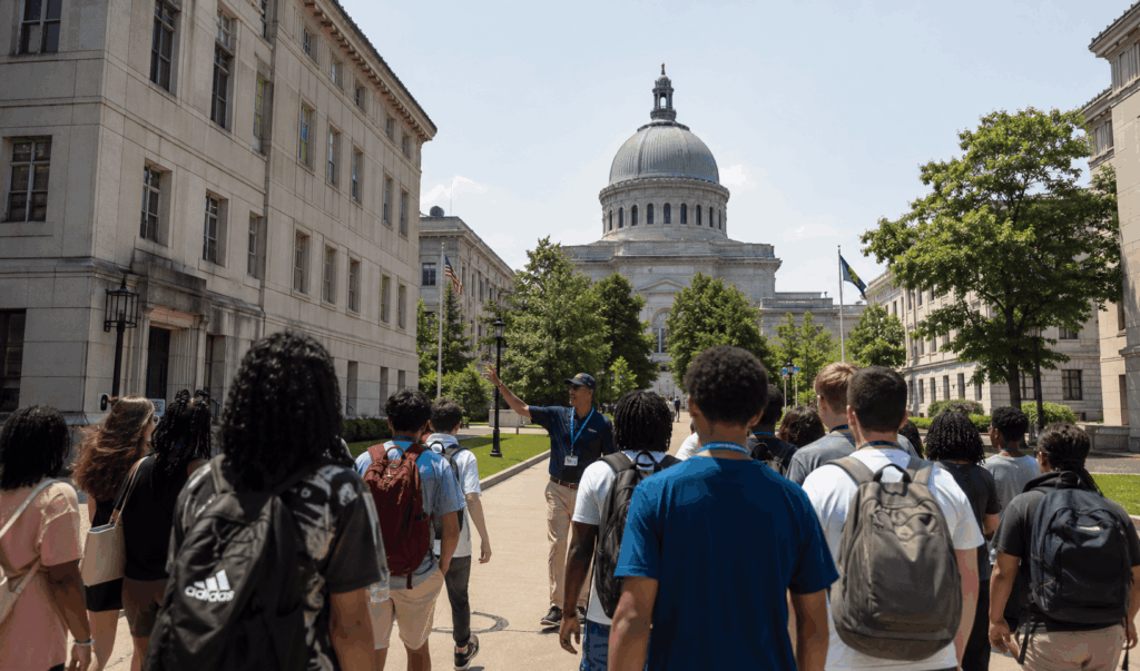 students and visitors touring the u.s. naval academy yard in annapolis maryland